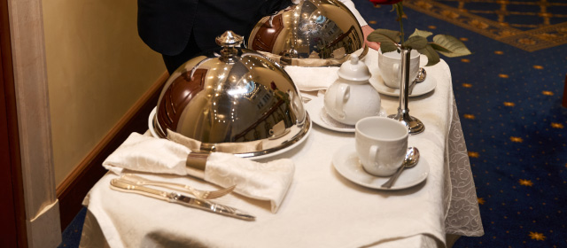 Mobile folding room service tables for the hotel industry.